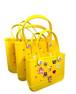 BOLSA DE MAO EM EVA AMARELO TAMANHO 46X21,5X33CM (G)